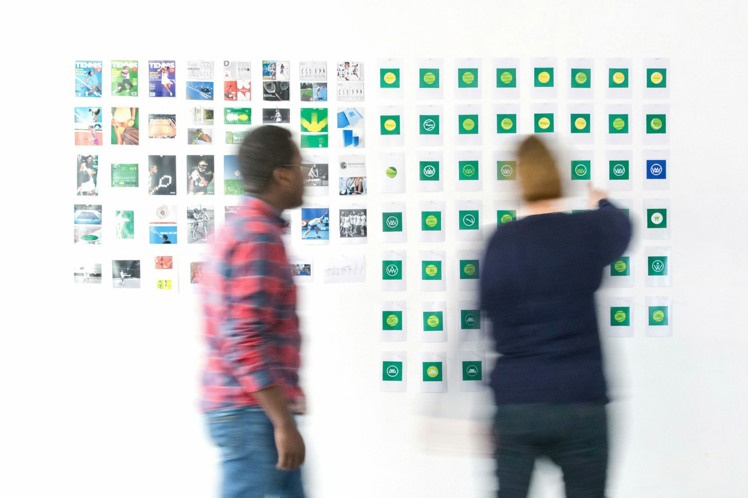 Team members collaborating on design work